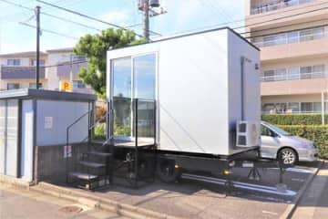 賃貸マンションの空き駐車場に「衣類乾燥機付きトレーラーハウス」