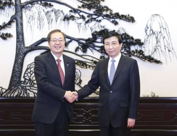 王滬寧政協主席、公明党代表団と会見　中日は手を携えて挑戦に対応を