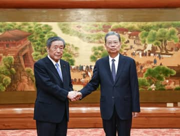 趙楽際氏、日中友好議連の森山裕会長と会見