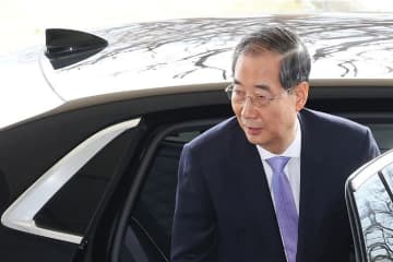 韓国大統領代行の韓悳洙首相が辞任表明