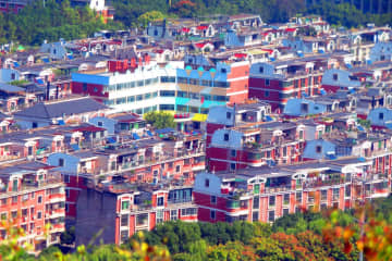 個人住宅ローンの貸出金利を0．25ポイント引き下げ、期間5年超の1軒目の金利2．6％に―中国