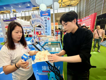 「中国のスピード」に挑む明治　新製品と現地化で市場深耕
