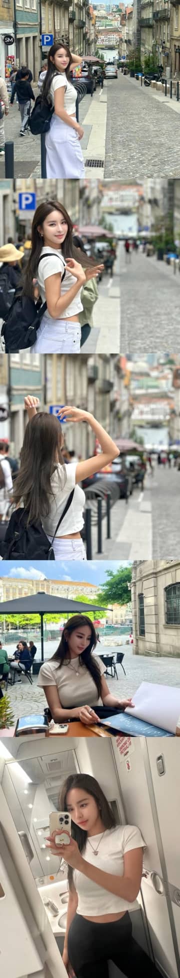 韓国の美しすぎる“ロードガール”、腹出しコーデで自慢の美貌を見せつける！「世界最高の美女」の声【PHOTO】
