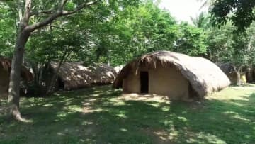 リー族の知恵の結晶「船型屋」　中国海南省白査村
