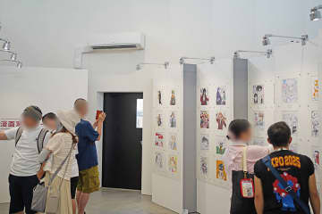 メンツすご…万博で整理券配布の反響、「漫画家９５人」のサインずらり