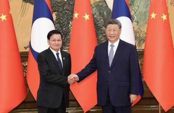 習近平氏、ラオス国家主席と会見