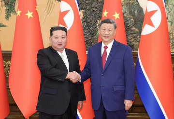 習近平氏、金正恩氏と会談