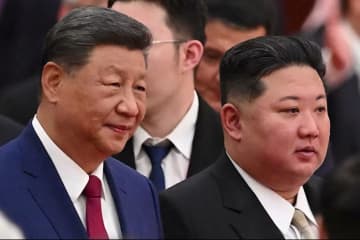 習近平氏と金正恩氏が公式会談、軍事パレードでプーチン氏との結束示した翌日