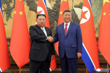 金正恩朝鮮労働党総書記が習近平中国共産党総書記と会談