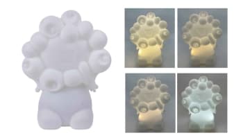 お座りミャクミャクがぼんやり光るシリコーンライト登場。振動で明るさが変わる