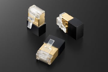 トップウイング、空きLAN端子に付けるノイズ混入防止アクセサリー「LANmute」