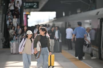中国、国慶節・中秋節連休初日の国内移動3.3億人超