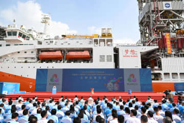 中国・広州市で全国運動会と障害者大会の聖火採火式