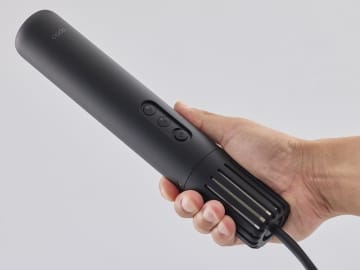 カドー、黒いスティック型のふとん乾燥機