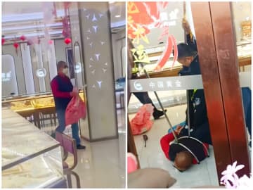 金宝飾品店に男が押し入る、多くの傍観者がいる中、淡々と落ち着いた様子―上海市
