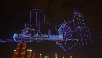 中国・重慶で世界都市デーのドローンショー