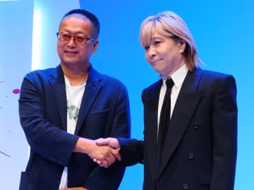 「アウトランカーズ」完成披露会。岡本吉起氏×小室哲哉氏の対談で明かされたあの名曲の裏側タイアップ楽曲は小室氏がプロデュースする音楽ユニット「OVAL SISTEM」が担当！