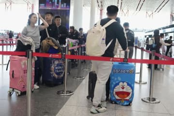 親日の中国人「自粛」困惑　治安悪化理由に疑問も