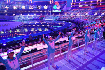 中国・第15回全国運動会を支えるボランティアたち