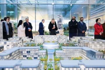 Xinhua Silk Road：シンクタンク代表団がJD.comグローバル本社を視察、デジタル・インテリジェンスの革新を体験