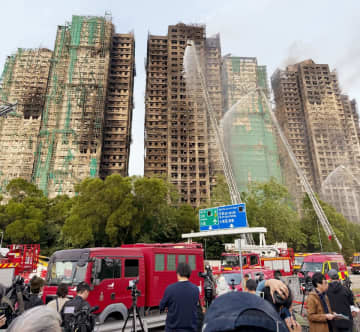 マンション火災の犠牲者1人当たり遺族に20万香港ドルの見舞金=香港特別行政区
