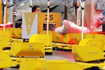 宅配便1800億個突破、三つのシーンに見る中国経済の新たな状況