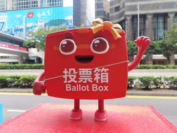 立法会選挙、安定と火災後の復興へ