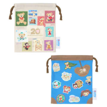 20年間の歴代アートをデザイン　ダッフィーの20周年きんちゃくセット