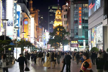 世銀、中国の成長率予測引き上げ　25年は4.9％