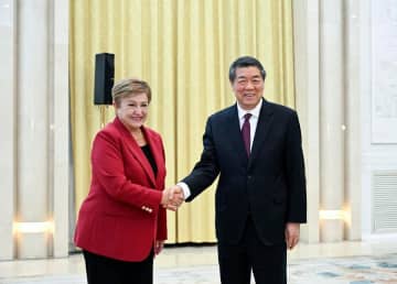 何立峰氏、IMF専務理事と会見