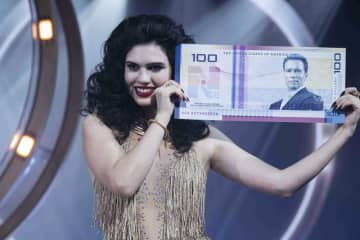 シュワルツェネッガーが描かれた奇妙な紙幣も　人生一発逆転のデスゲーム　「ランニング・マン」場面写真