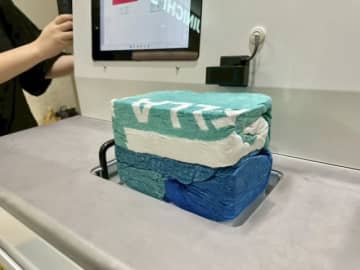 「帰りの荷物が入らない問題」に対応！ 羽田3タミで"衣類圧縮"サービスを実証