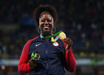 Gold medalist Michelle Carter of the United States celebrates on the podium during the medal ceremony for the Women's Shot Put on Day 8 of the Rio 2016 Olympic Games at the Olympic Stadium on August 13, 2016 in Rio de Janeiro, Brazil.
