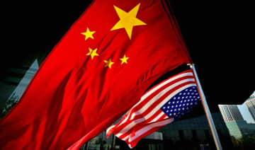 米政府職員の出国禁止に関し提供できる情報ない　中国外務省