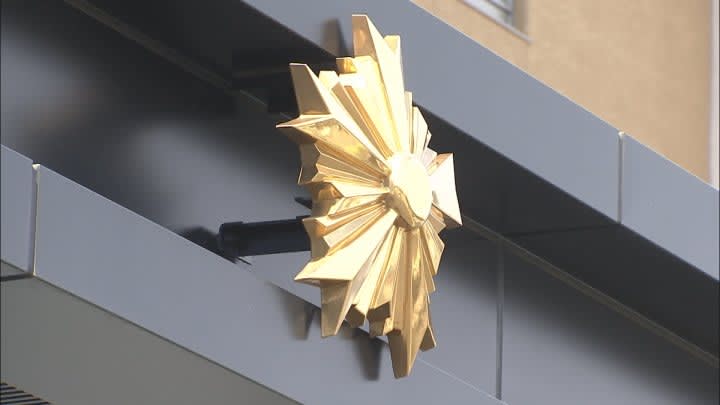 A 37-year-old office worker was arrested on suspicion of voyeuring his skirt with a wristwatch-type camera.