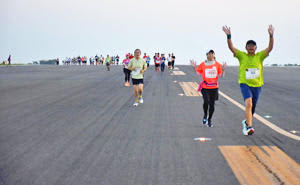 Running on the "runway" in the early morning Fukushima Airport's 30th anniversary, the first marathon event