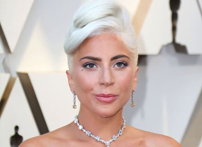 Lady Gaga goes vintage with updo and red lipstick