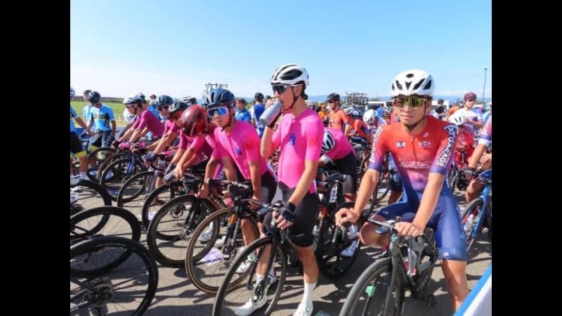 A male athlete in his 20s is seriously injured after colliding with a car during a bicycle race... On the first day of the ``Tour de Hokkaido'', a group in front of him was chased...