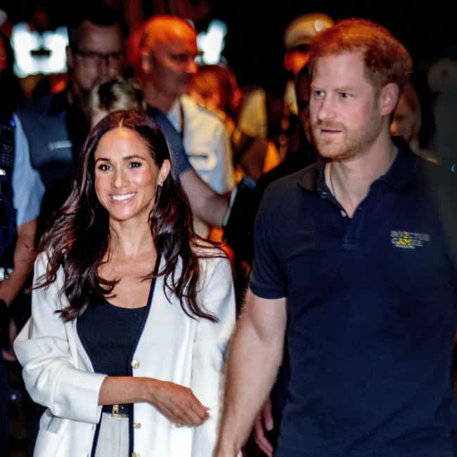 Duchess Meghan and Prince Harry watch basketball together in Germany