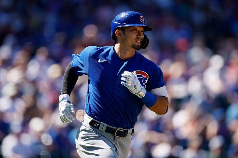 Japanese outfielder Seiya Suzuki shows his uniform number 27 in Mesa,  Arizona on March 19, 2022. The 27-year-old Suzuki recorded .317 with 38  homers and 88 RBIs in 132 games last season