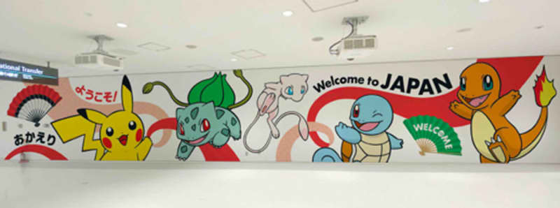 Pokemon illustrations posted at Narita Airport's Terminal 2 international arrival concourse