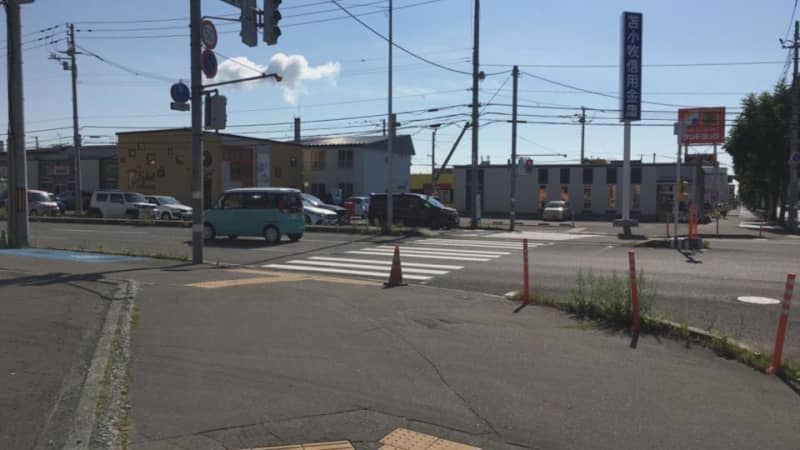 A woman in her 40s suffers minor injuries after a car turns right and hits a bicycle coming straight at an intersection in Tomakomai, Hokkaido.