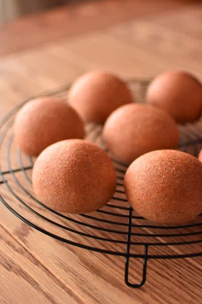 Fragrant round bread made by hand using strong whole wheat flour.