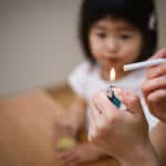 Introduction of lighter regulations, effective in reducing fires caused by playing with fire