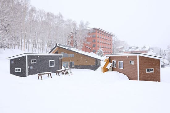 A trailer house opens at Shiga Kogen Ski Resort, and you can access the slopes as soon as you open the door.