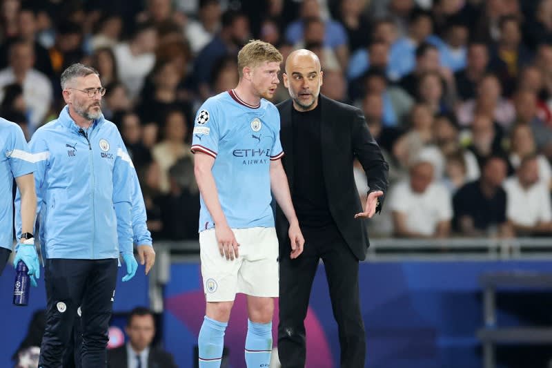 De Bruyne, currently out with injury, hints at return in January...Pep also responds: ``Happy New Year''