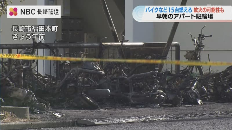 15 motorcycles and bicycles burned, reports of ``seats and tires damaged'' surrounding the scene, investigation into possible arson