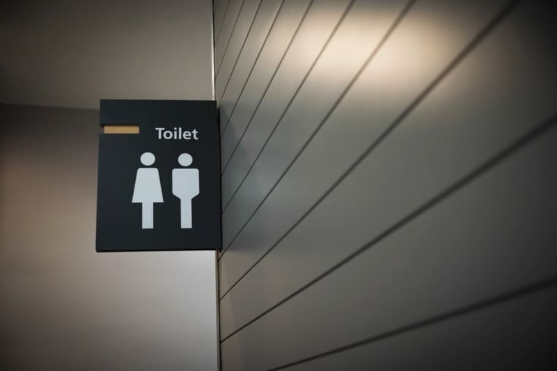 I was warned that I use the restroom too often during work...how many times a day should I do it?