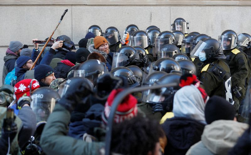 Canadian police arrest dozens to sweep protesters from parliament area 13 origin 1