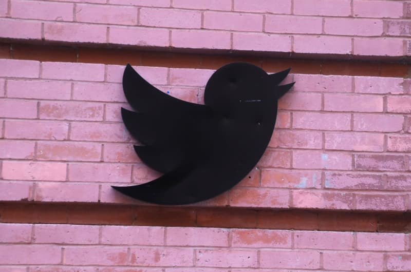 Report: Musk considering putting Twitter behind…